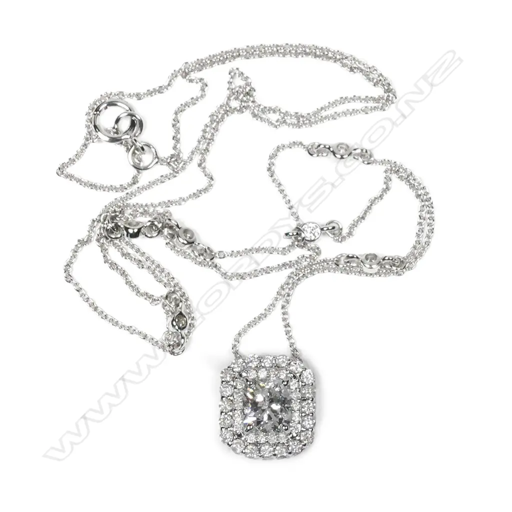 A 14ct white gold diamond double halo Art Deco style pendant Image 1++