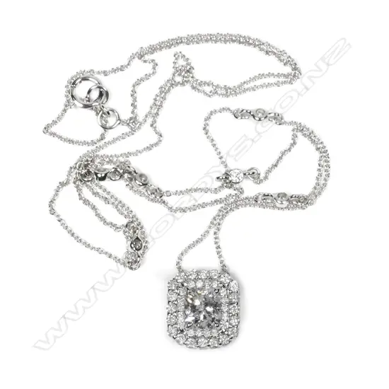 A 14ct white gold diamond double halo Art Deco style pendant