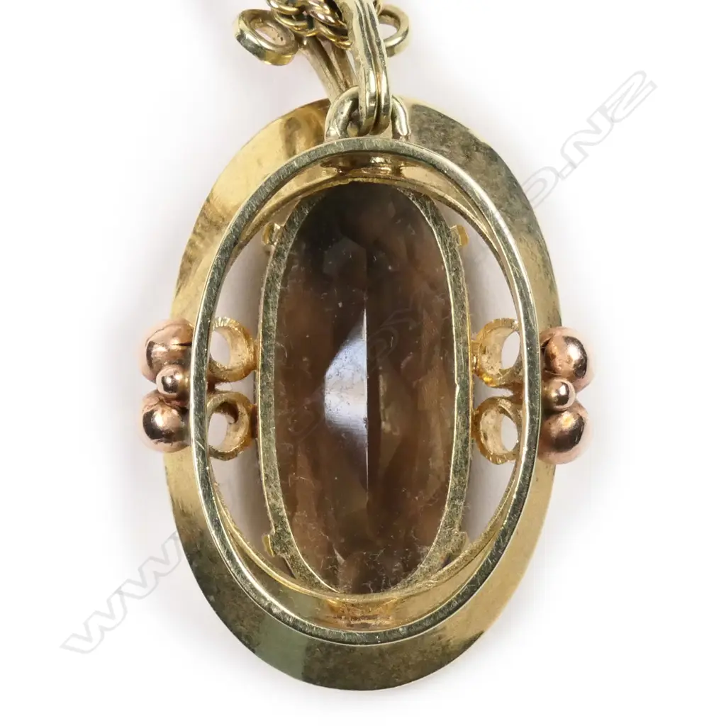 A retro 14ct gold smoky quartz pendant Image 1++