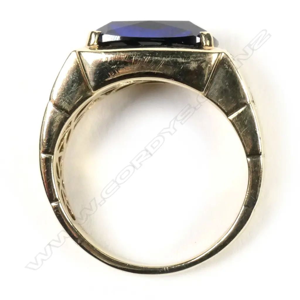 A gent’s blue stone and diamond ring Image 1++