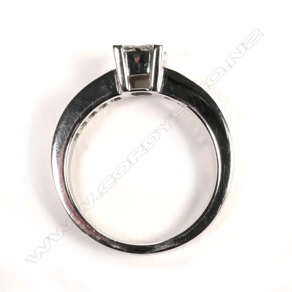 An 18ct white gold and diamond cluster ring Image 1++