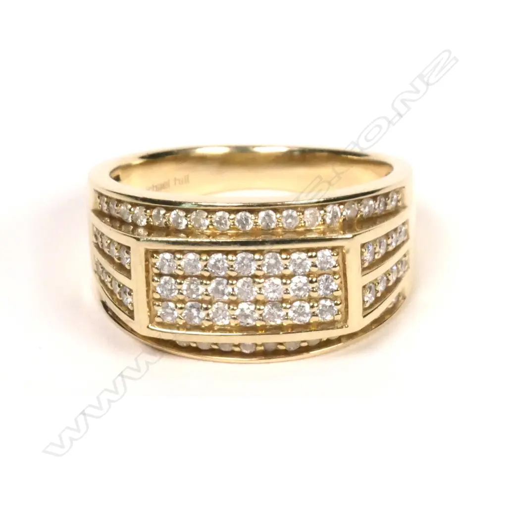 A gent’s 10ct yellow gold and multi diamond ring Image 1++