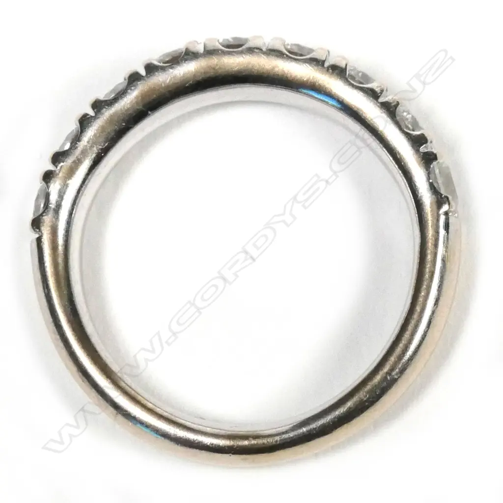 An 18ct white gold and diamond set band Image 1++