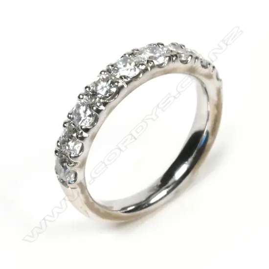 An 18ct white gold and diamond set band