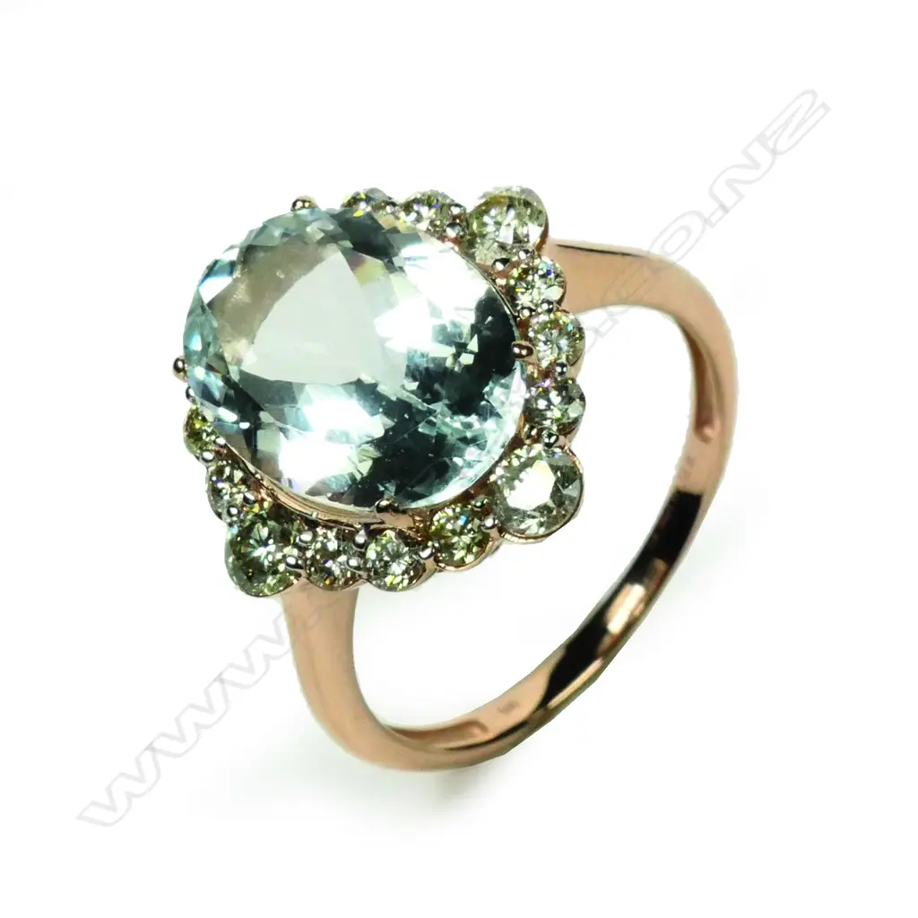 A 14ct rose gold aquamarine and diamond ring Image 1++