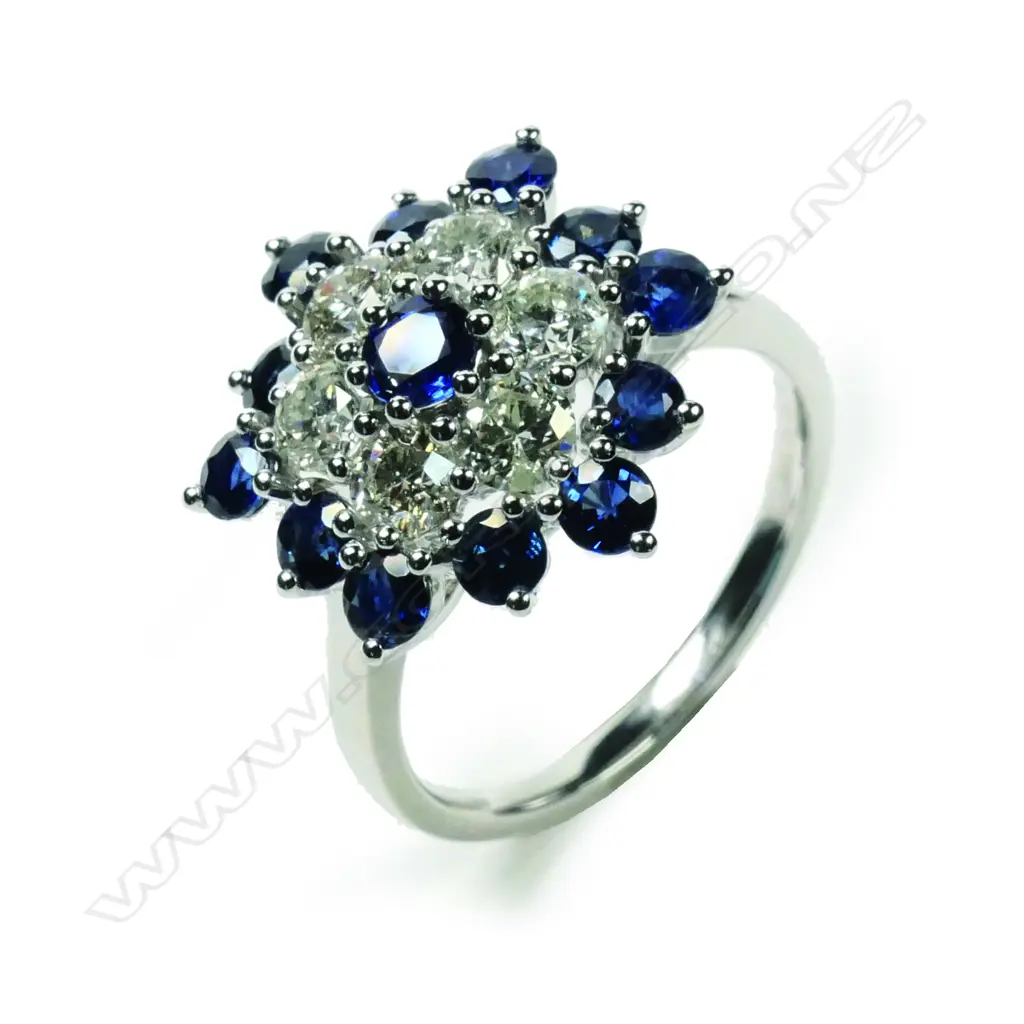 A 14ct white gold sapphire and diamond ring Image 1++