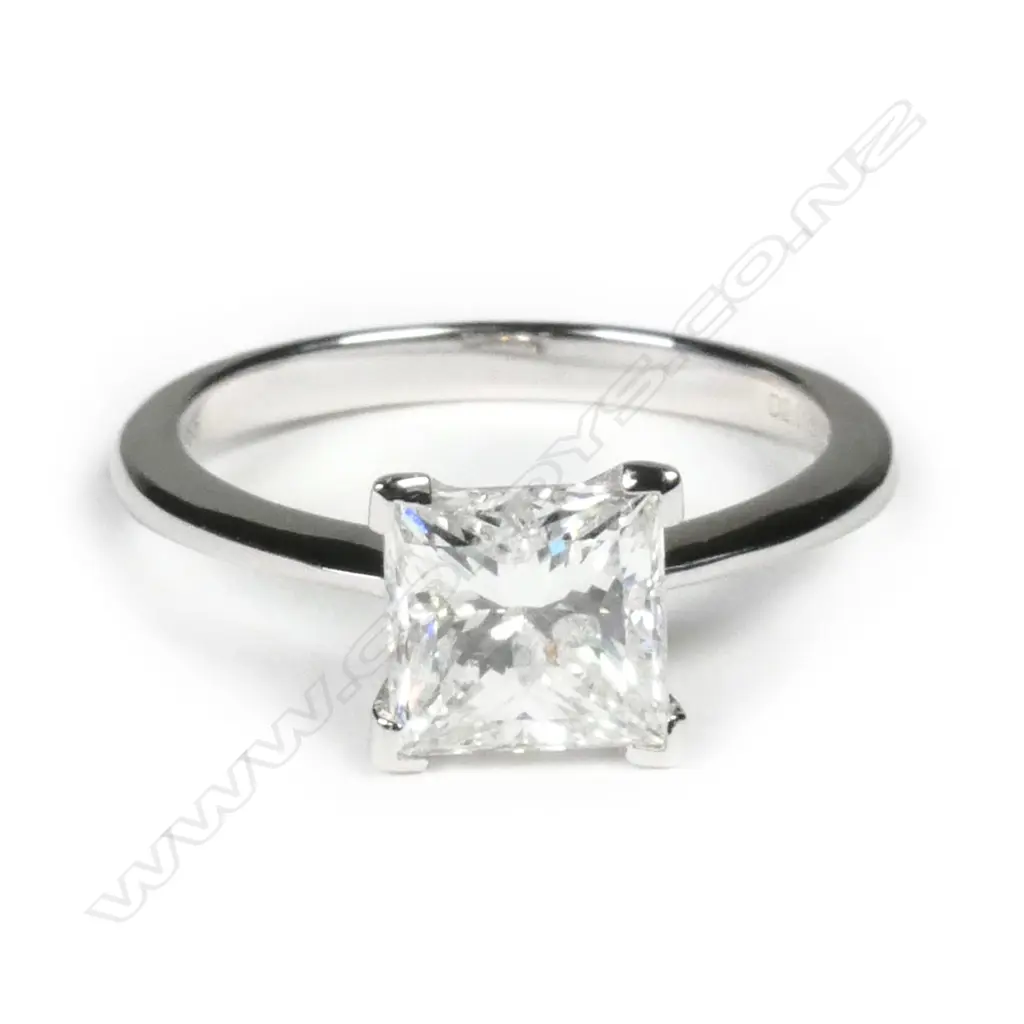 A 14ct white gold and diamond solitaire ring Image 1++
