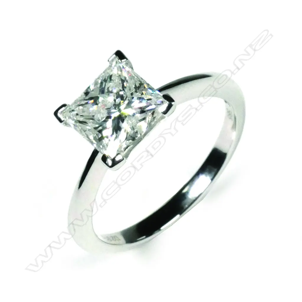 A 14ct white gold and diamond solitaire ring Image 1++