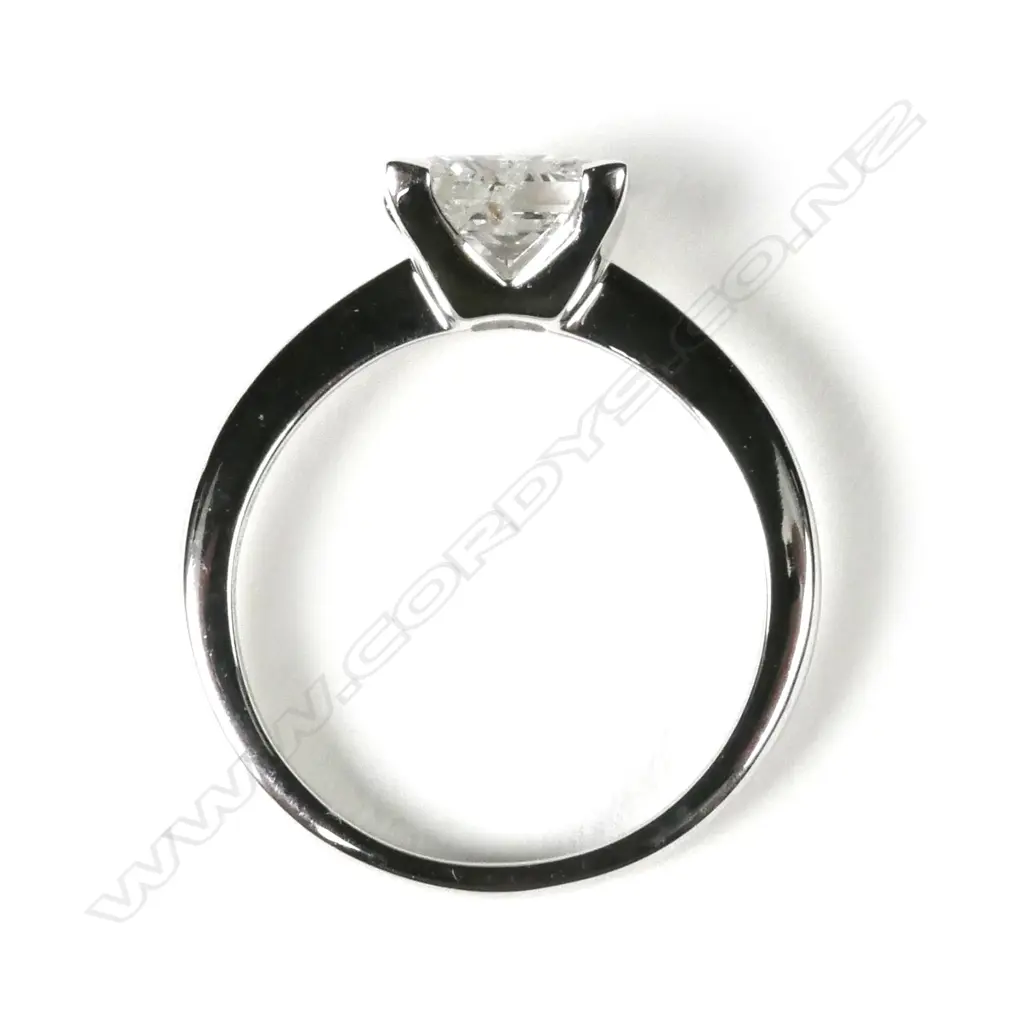 A 14ct white gold and diamond solitaire ring Image 1++