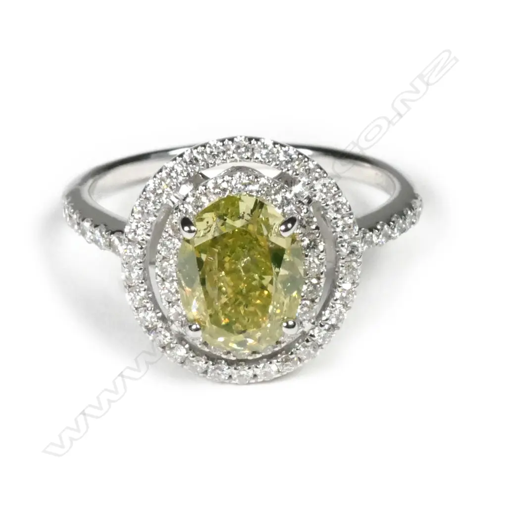 An 18ct white gold diamond double halo ring Image 1++