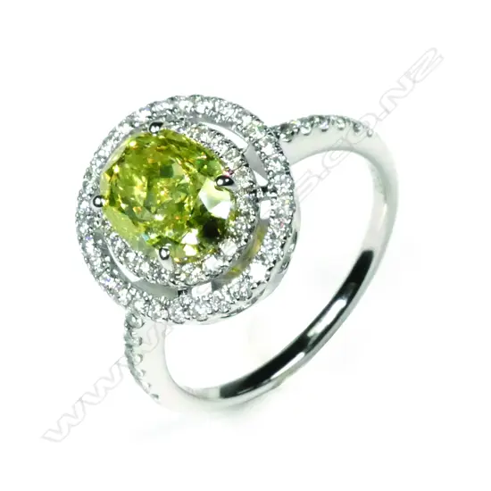 An 18ct white gold diamond double halo ring