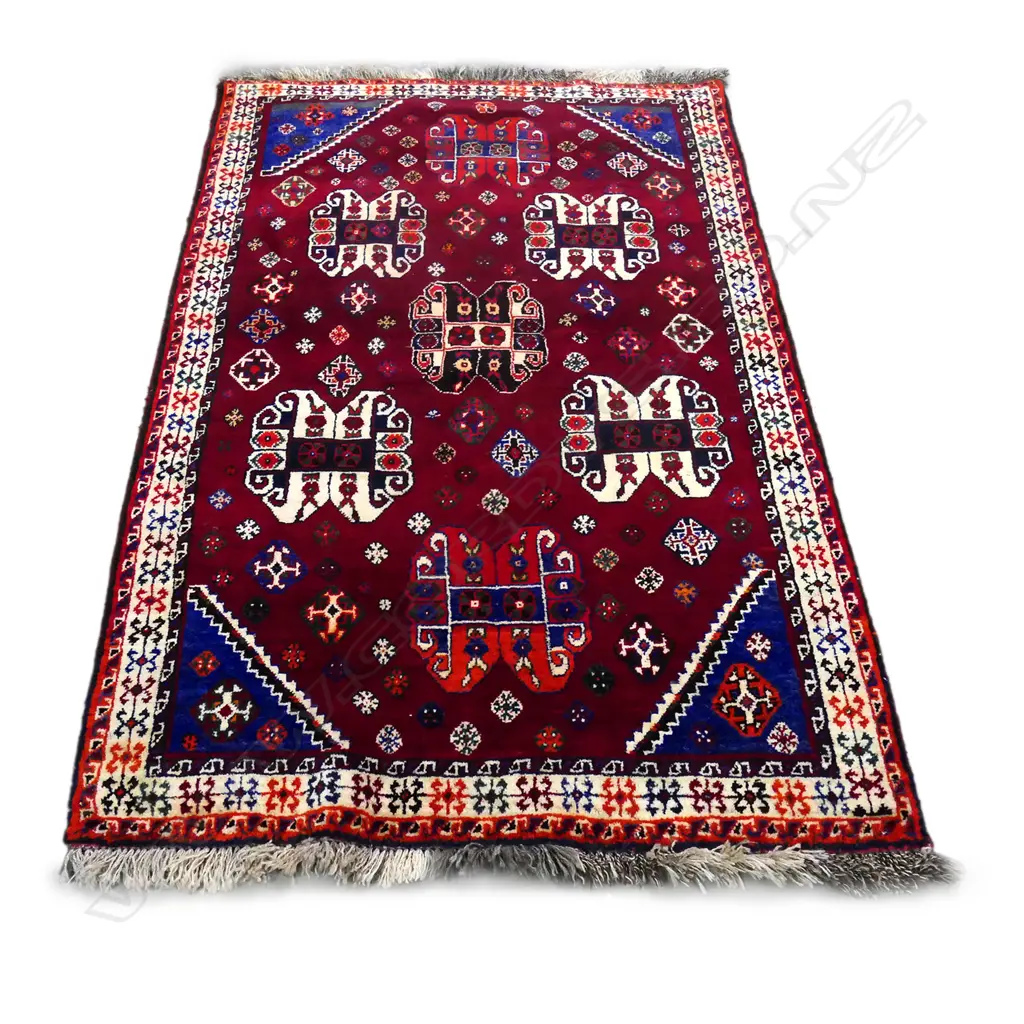A Persian all wool rug Image 1++