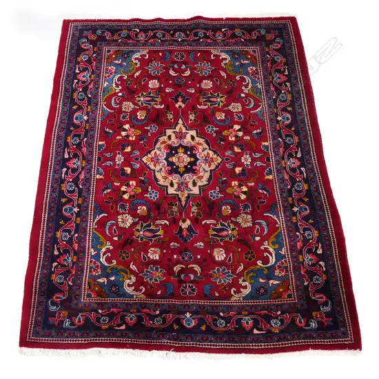 A Persian Arak hand knotted rug