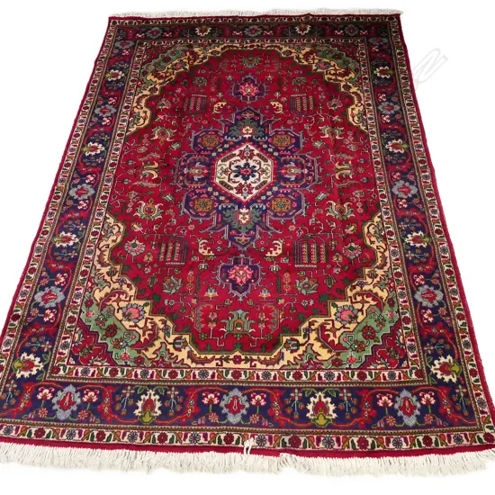 A Tabriz hand knotted carpet