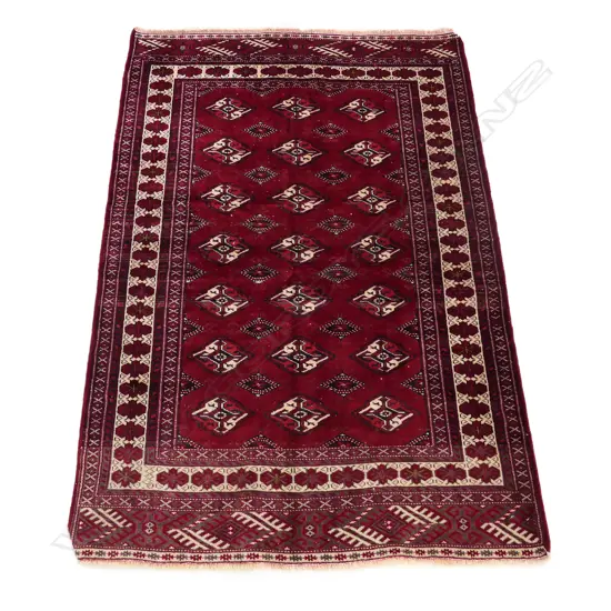 A Turkman hand knotted rug