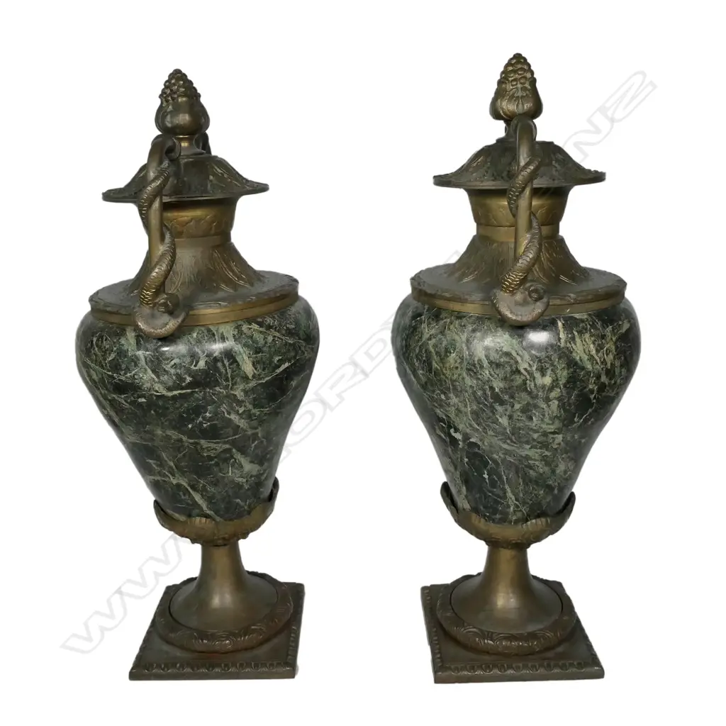 A pair of substantial granite and brass urns Image 1++