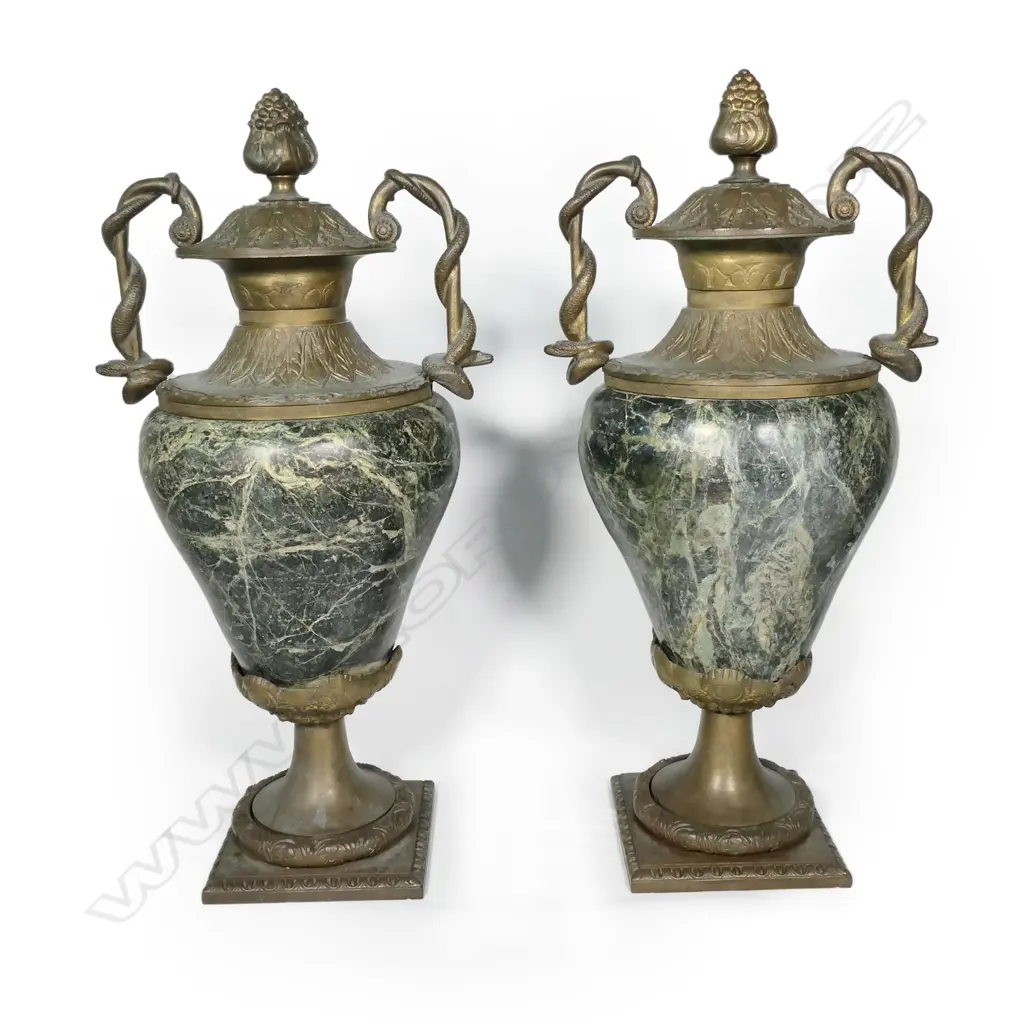 A pair of substantial granite and brass urns Image 1++