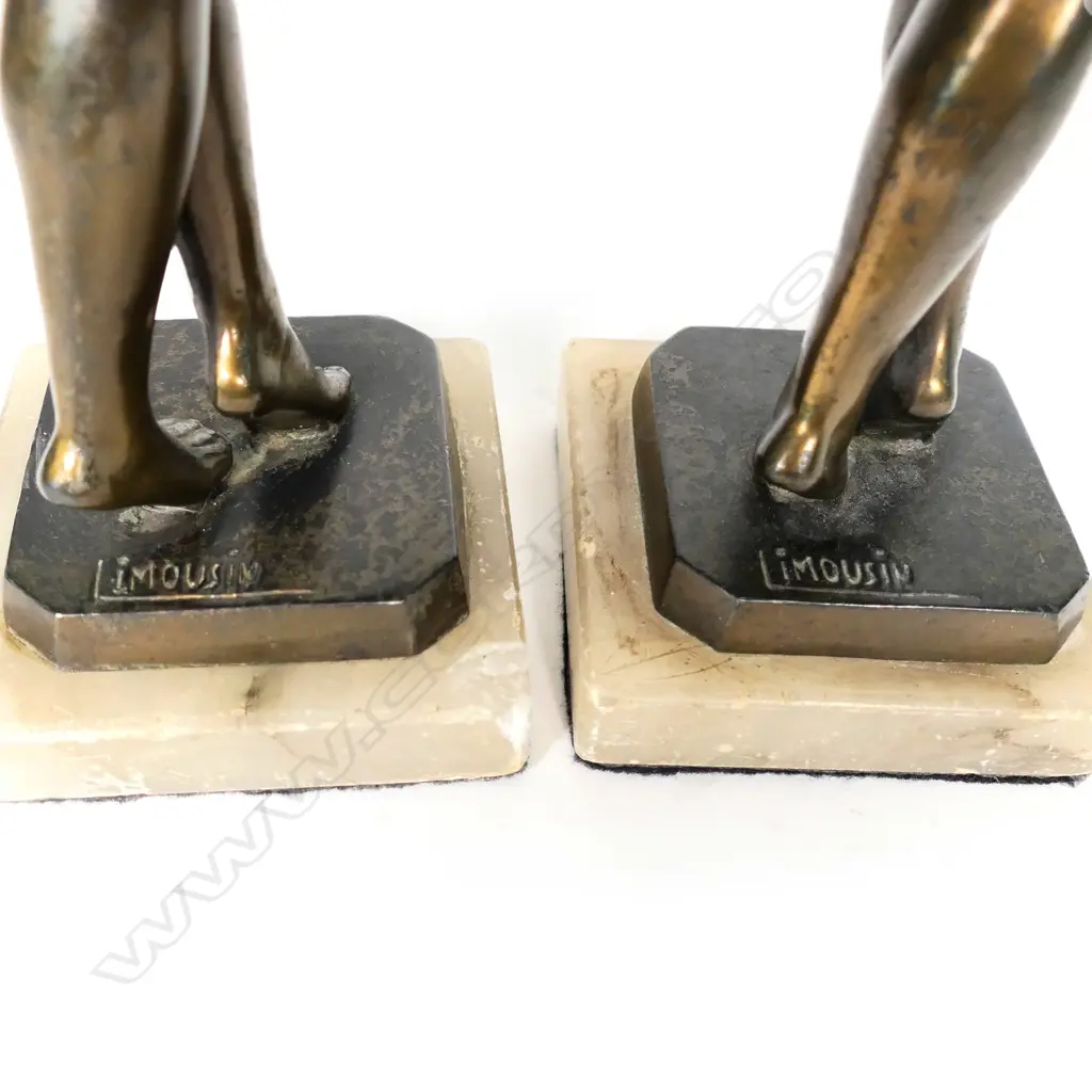 A pair of bronzed Art Deco figures Image 1++