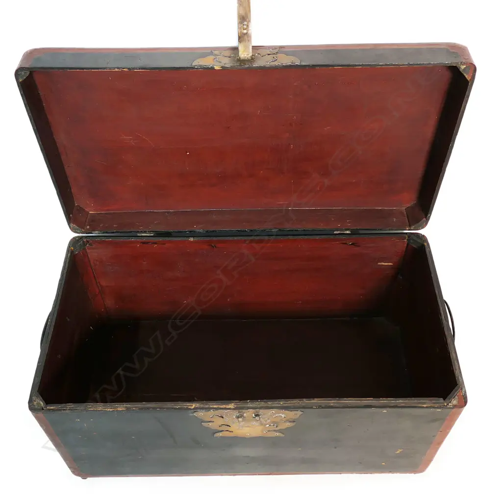 A near pair of Korean wedding chests, in black and maroon lacquer, oblong, with later glass tops to serve as occasional tables, largest 660 x 340 x 370mm. Image 1++