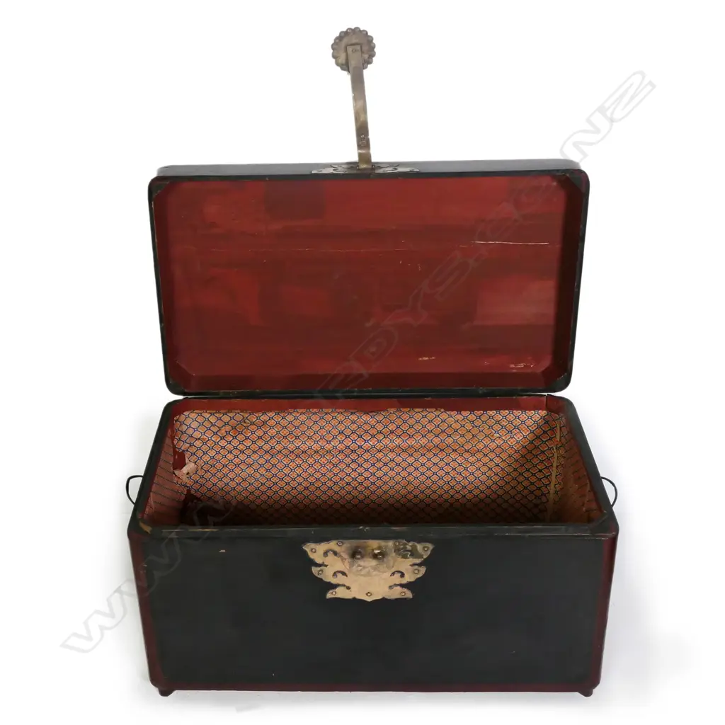 A near pair of Korean wedding chests, in black and maroon lacquer, oblong, with later glass tops to serve as occasional tables, largest 660 x 340 x 370mm. Image 1++