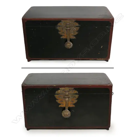 A near pair of Korean wedding chests, in black and maroon lacquer, oblong, with later glass tops to serve as occasional tables, largest 660 x 340 x 370mm.