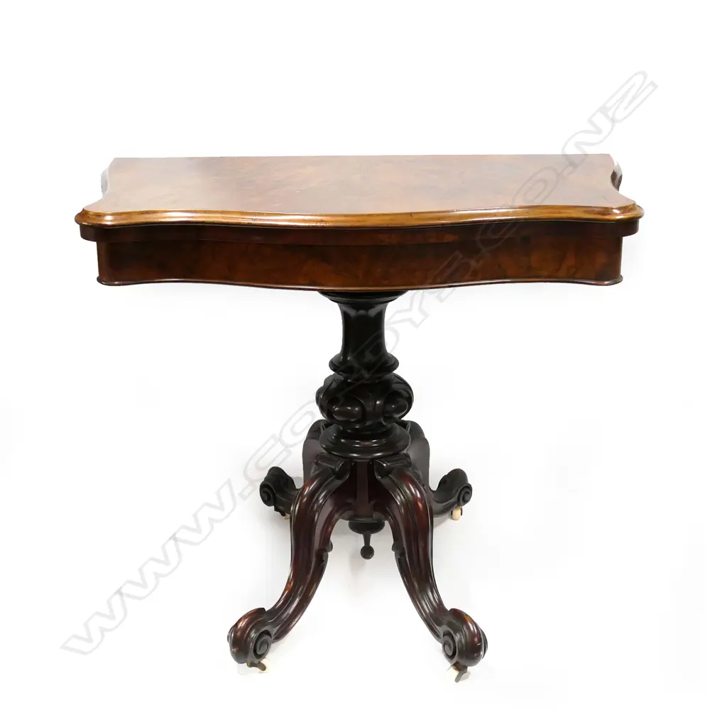 A Victorian walnut card table Image 1++