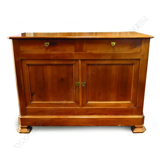 A small 19thC French provincial chestnut two-door sideboard of generous proportions