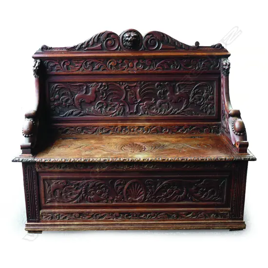 A Victorian oak hall seat