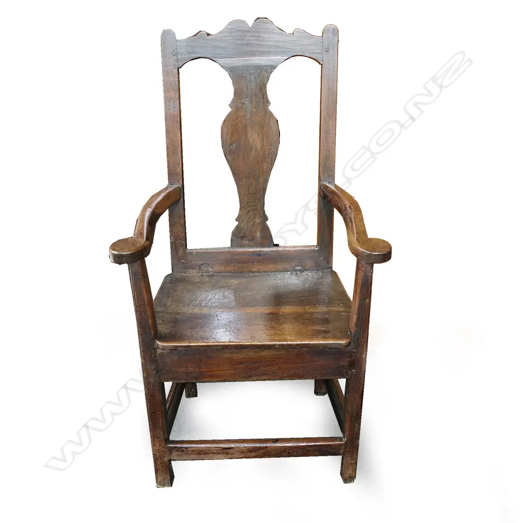 A substantial Georgian country oak armchair Image 1++