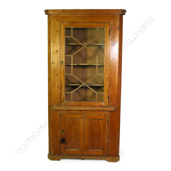 A Victorian pine standing corner cabinet