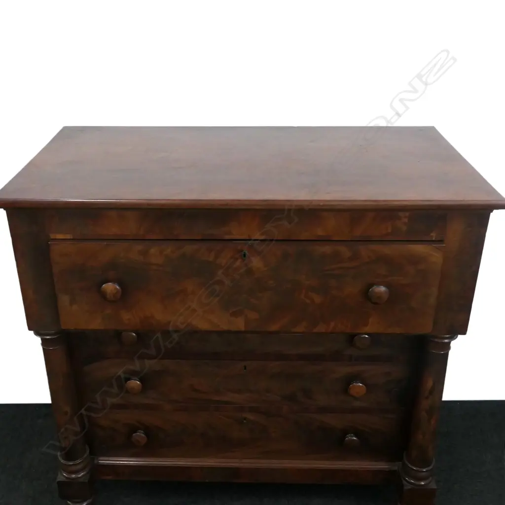 A Victorian flame mahogany secretaire chest Image 1++