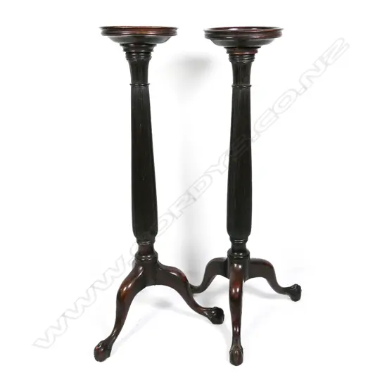 A pair of mahogany Georgian style torcheres