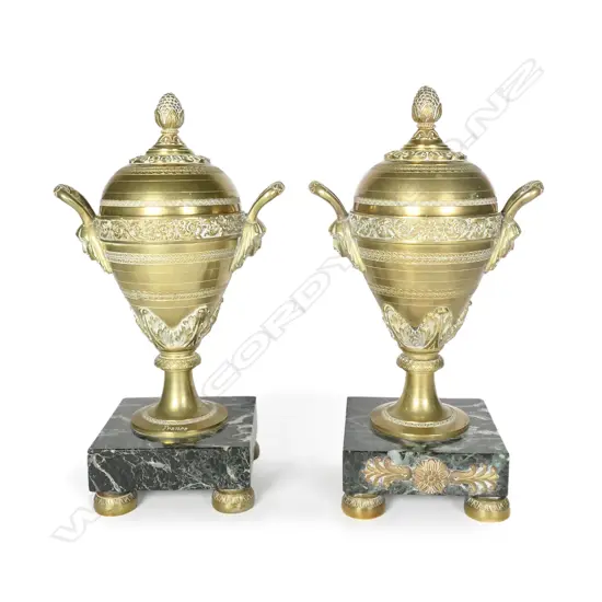 A pair of 19thC French bronze and marble lidded urn garnitures