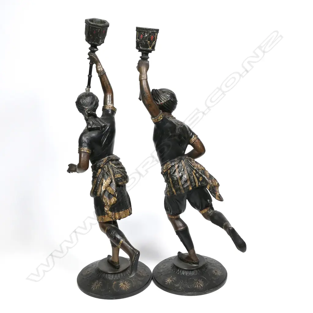 A pair of vintage spelter candlesticks Image 1++