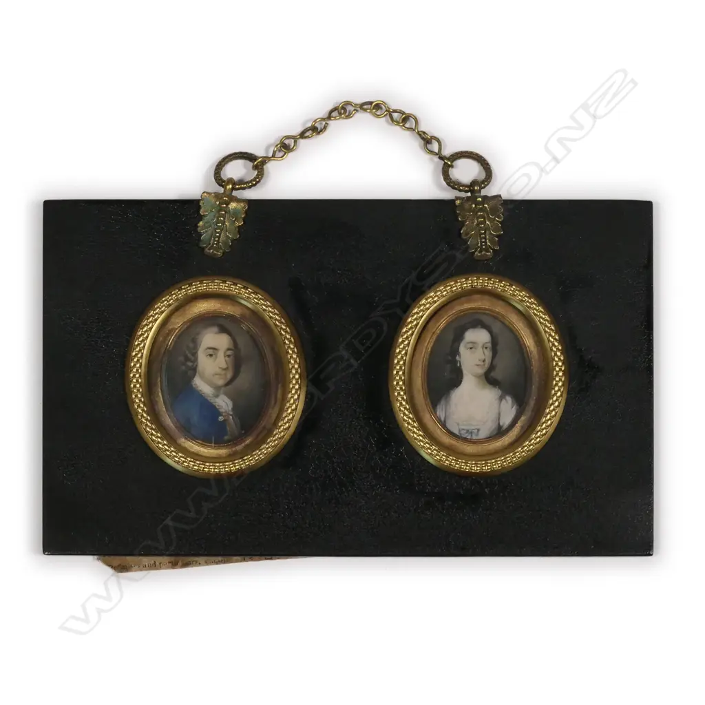 A good pair of 18thC miniature portraits of a man and wife Image 1++