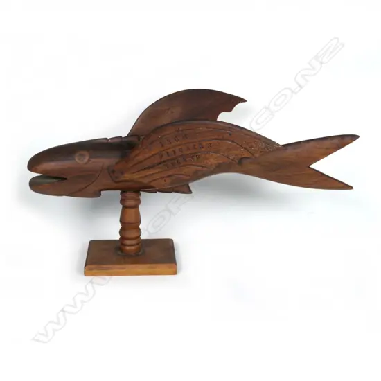 A Pitcairn Island carved wood flying fish sculpture