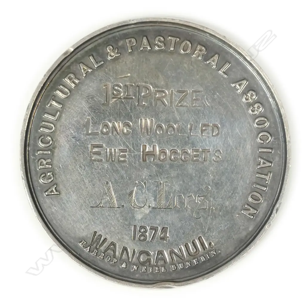 An 1874 Wanganui A&P Assoc. Harrop & Neill silver medal Image 1++