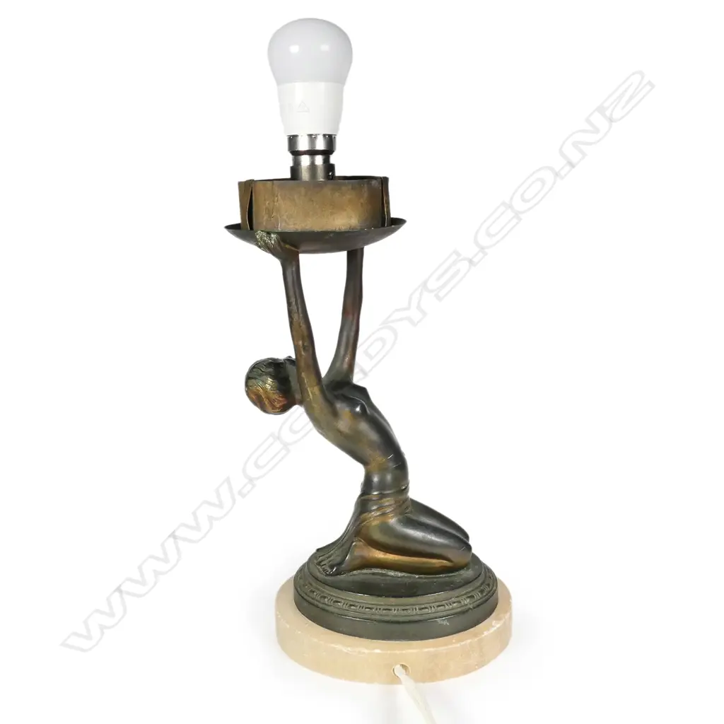 An Art Deco cold painted spelter figured lamp base Image 1++