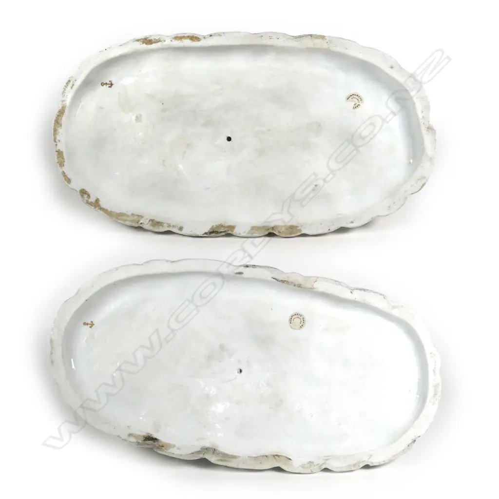 A pair of porcelain studies of hunting hounds Image 1++