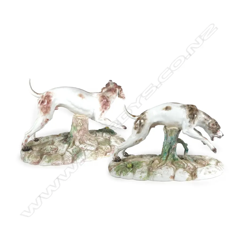 A pair of porcelain studies of hunting hounds Image 1++
