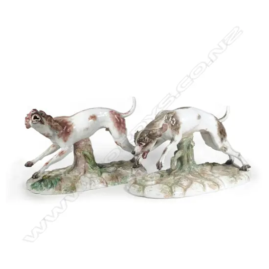 A pair of porcelain studies of hunting hounds
