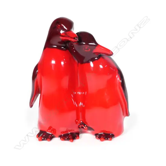 A Royal Doulton flambe model of two penguins