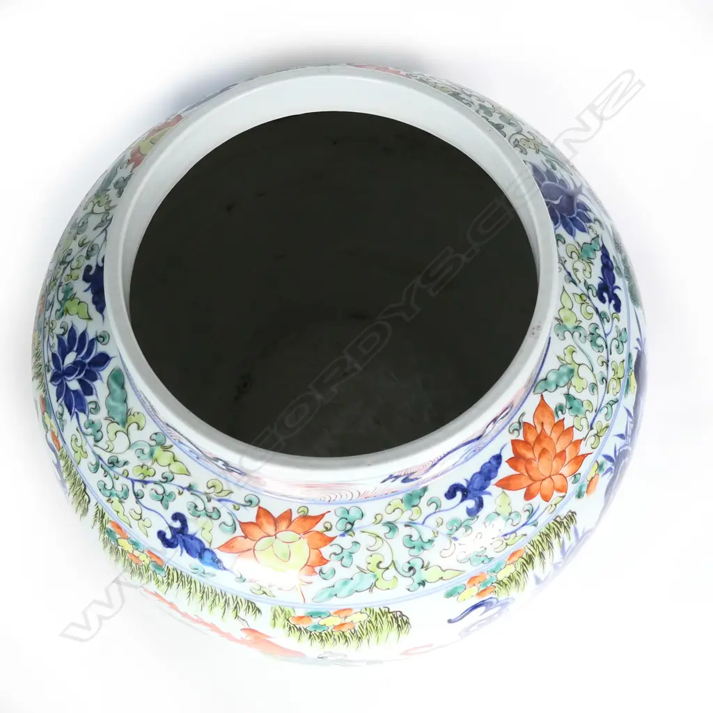 An Oriental large baluster famille rose vase Image 1++