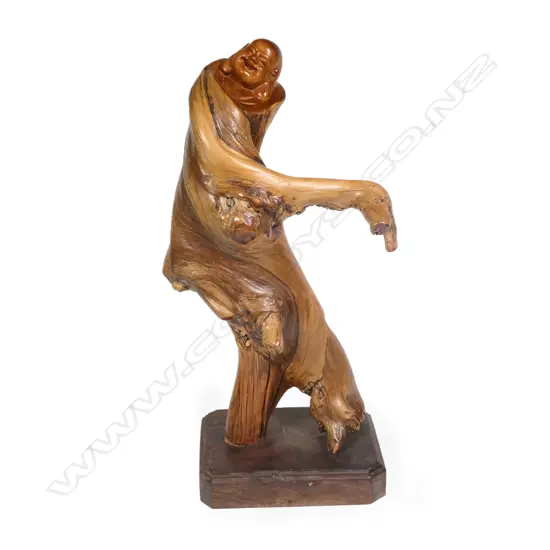 A Sichuan thuja (cliff cypress) branch with carved bust of the Maitrya Buddha,