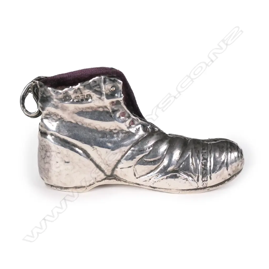 An uncommon Edwardian silver boot pin cushion Image 1++