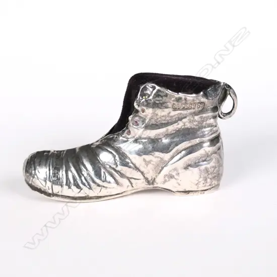 An uncommon Edwardian silver boot pin cushion