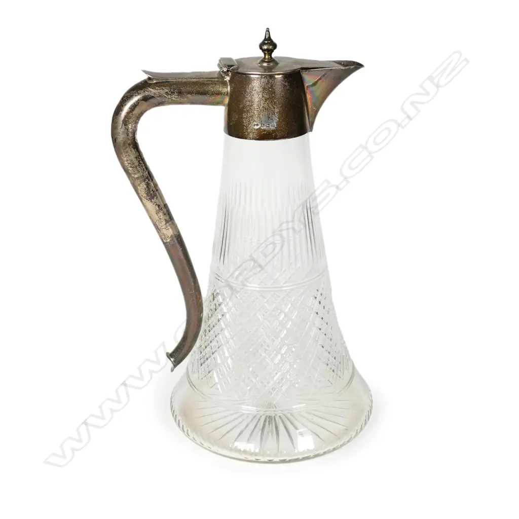 An Edwardian silver mounted cut crystal claret jug Image 1++