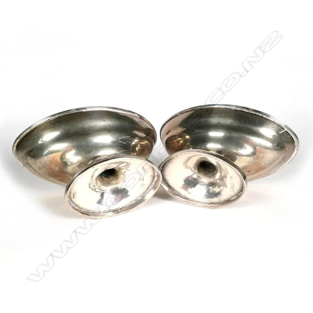 A pair of Georgian Scottish silver boat shaped salts on pedestal bases Image 1++