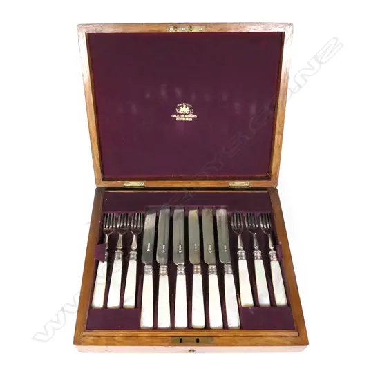 A set of late Victorian silver fruit knives and forks with mother-o'-pearl handles