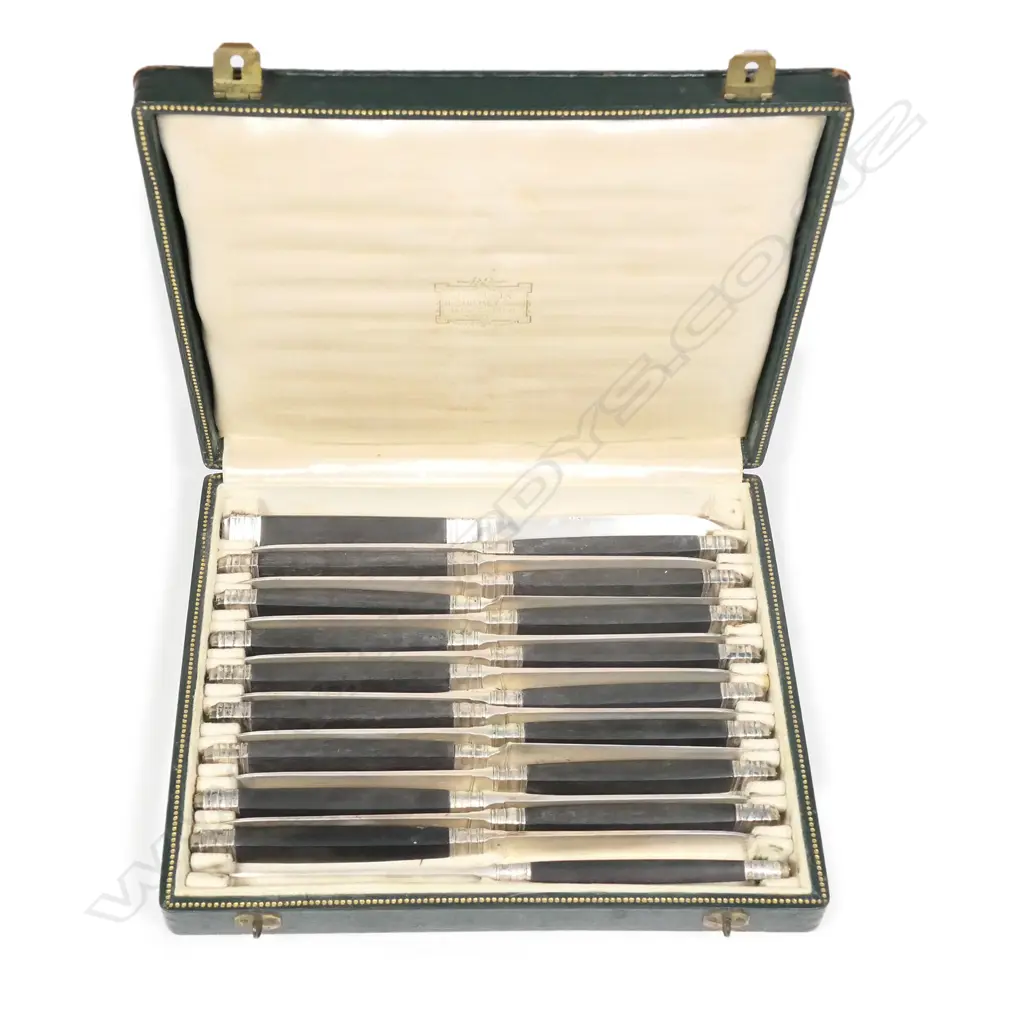 A cased set of 18 French silver bladed knives Image 1++